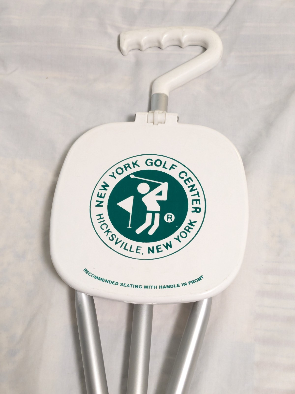 Pair Of Folding Three-legged Sports Seats Golf New York Golf Center...
