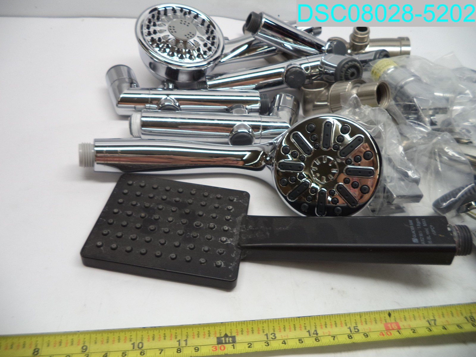 QTY=17: Assorted Size And Color Shower Heads And Holders