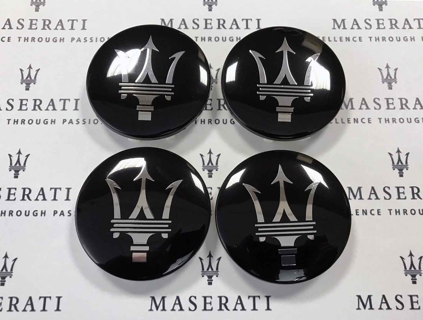 MASERATI WHEEL CENTER CAPS BLACK WITH CHROME TRIDENT LOGO SET OF 4