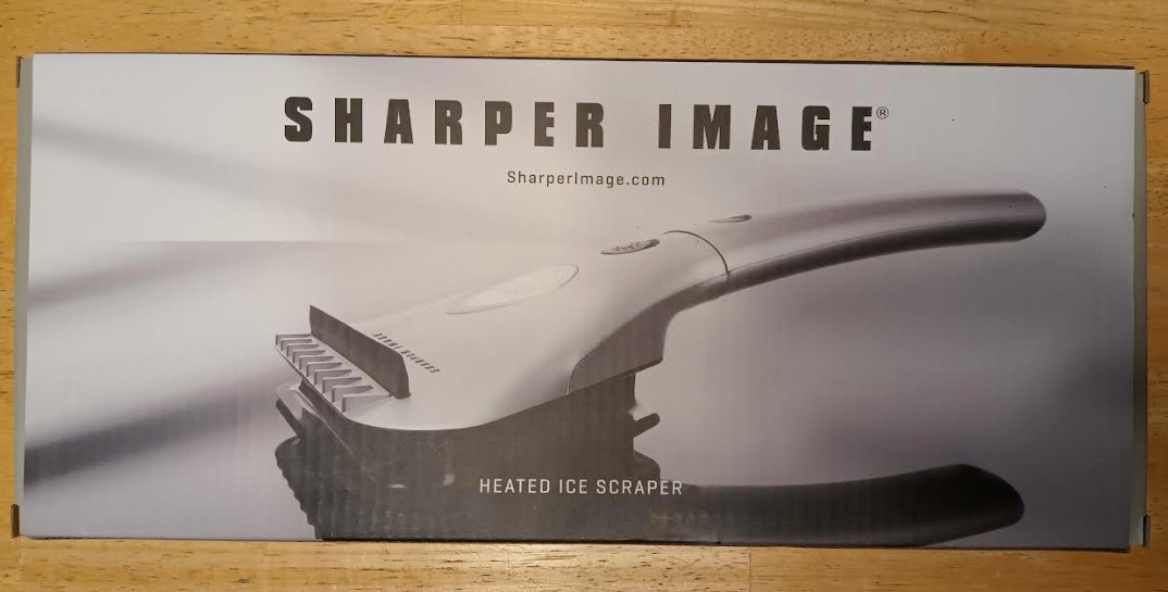 Heated Ice Scraper. Sharper Image. Never used.