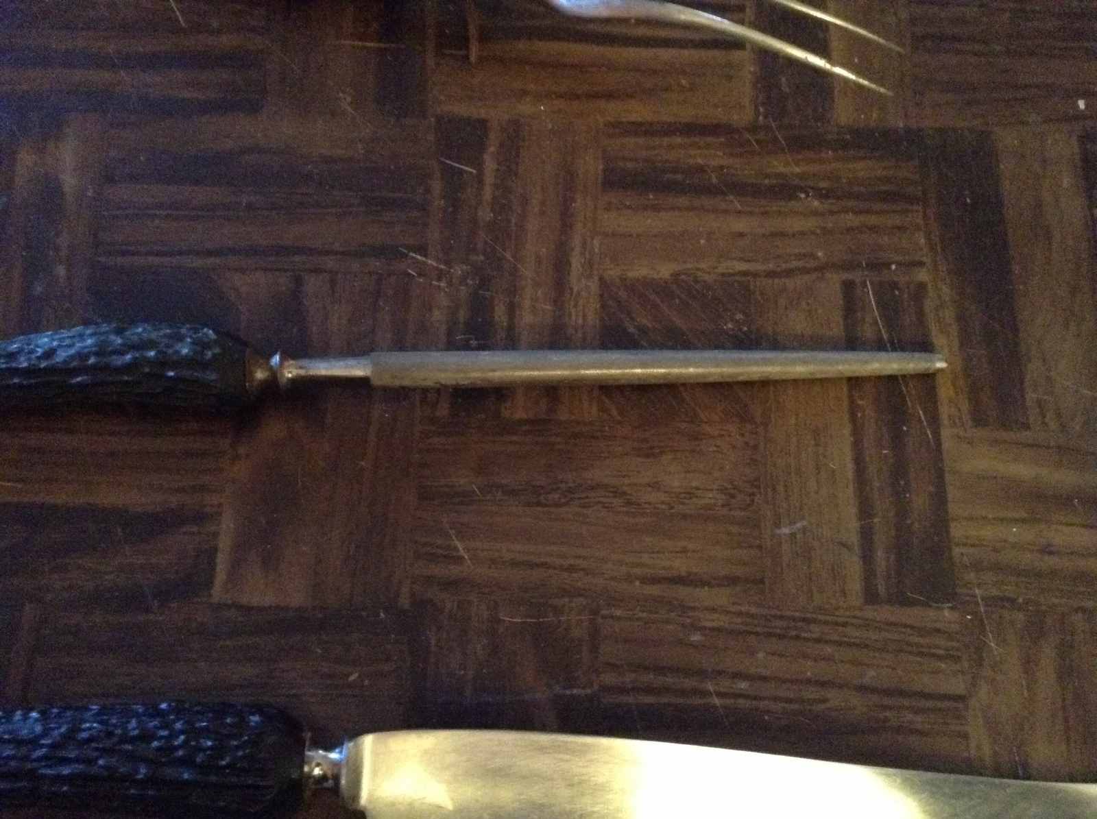 Set of black handle carving utensils
