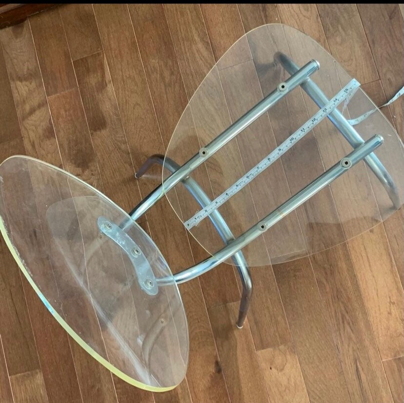 Contemporary acrylic and steel chair. Artsy!