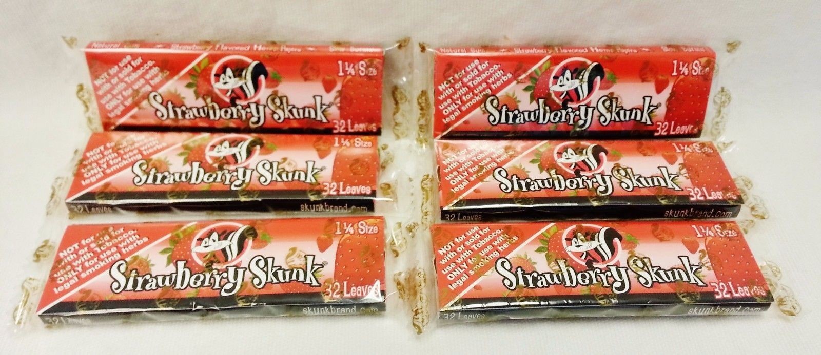 6X Skunk Brand 1 1/4 Strawberry Flavored Rolling Papers 32 Leaves Per Pack