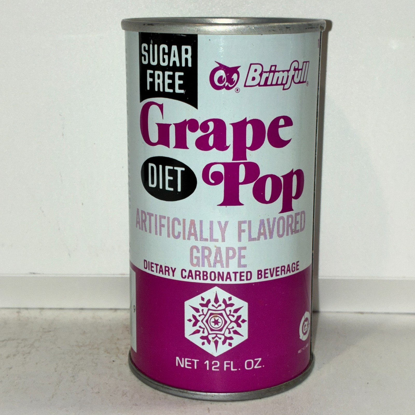 Brimfull Sugar Free Diet Grape Pop soda can, bottom opened