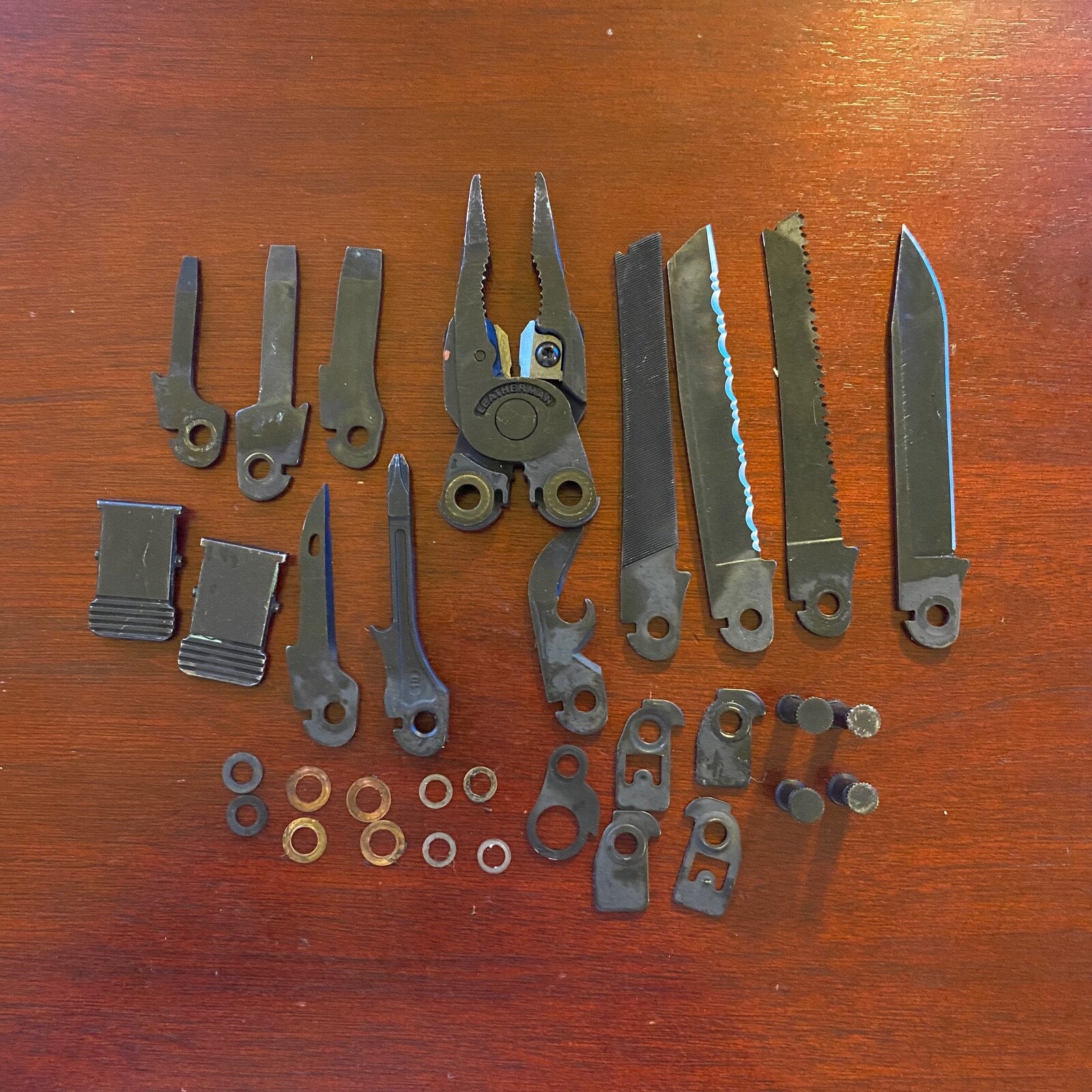 Parts from Black Oxide Leatherman Super Tool 300: 1 Part for repairs or mods