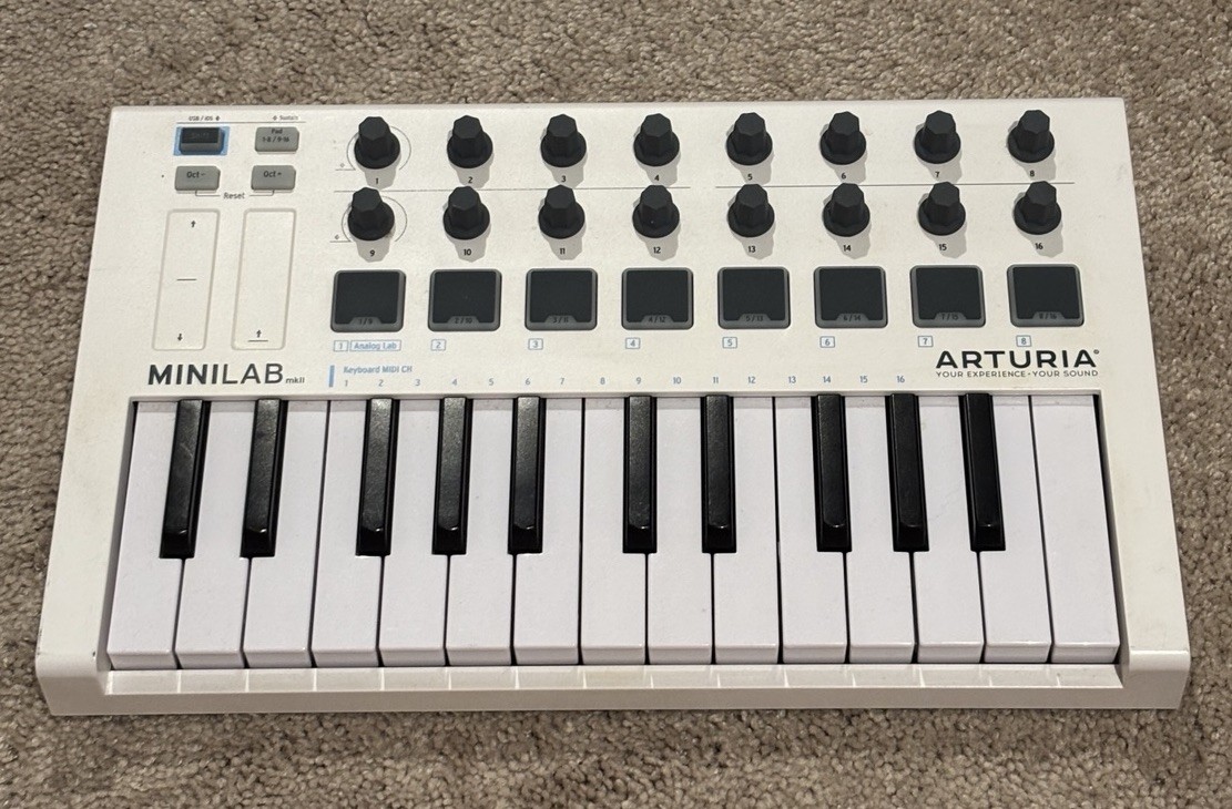 Arturia MiniLab MkII MIDI keyboard controller (25-key) in white.