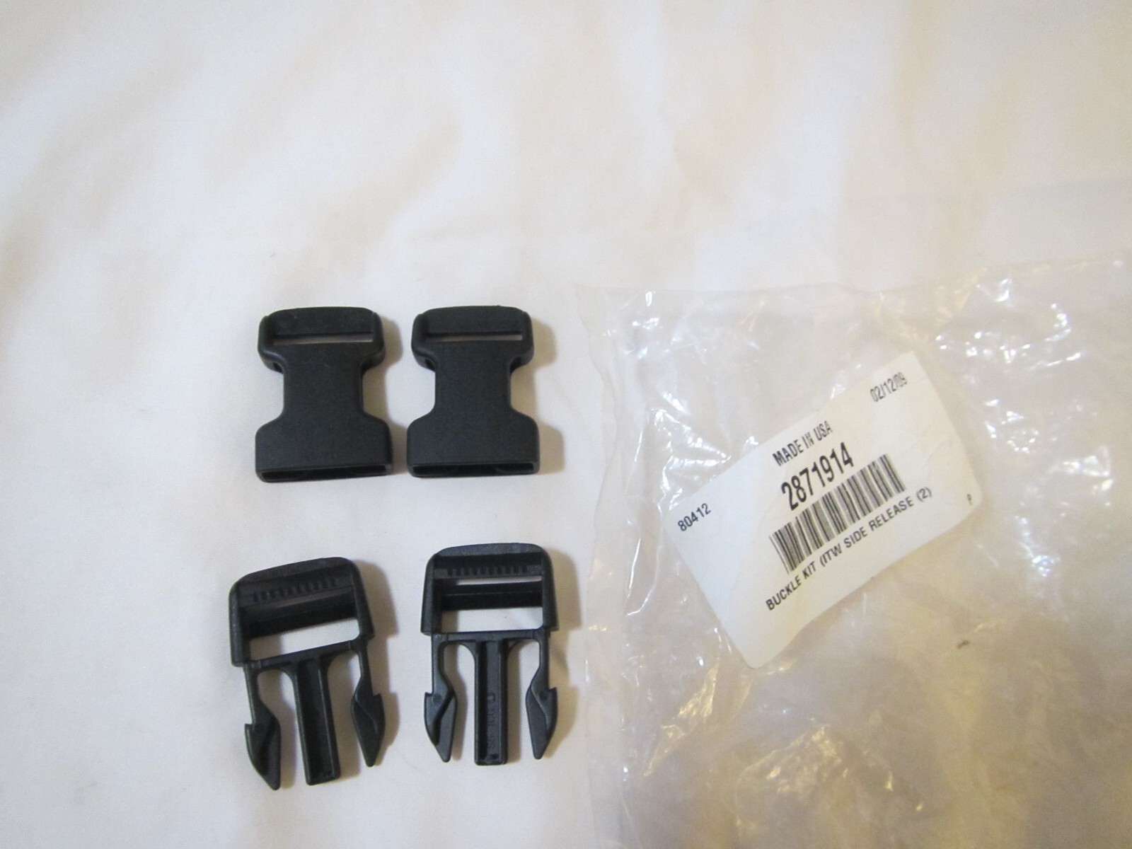NOS, OEM Polaris Buckle with side release #2871914
