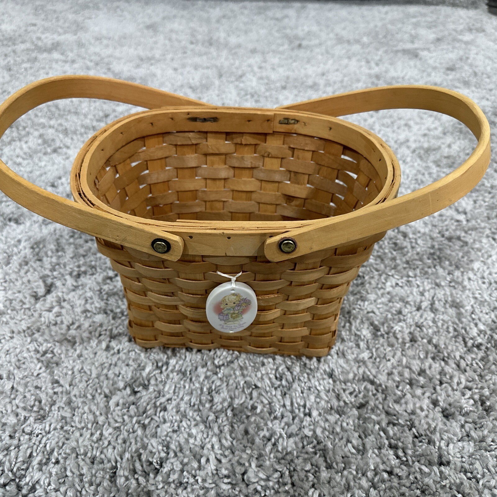 Precious Moments double handled weave basket with opening 10.75 x8  depth 7.5