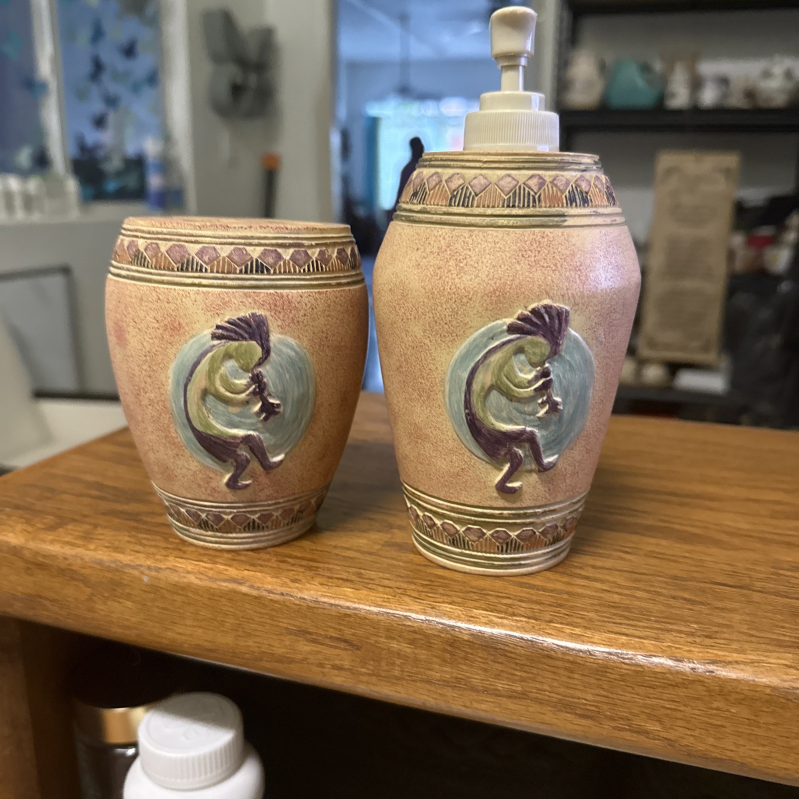 vintage bathroom set features a Kokopelli resin toothbrush holder &  dispenser