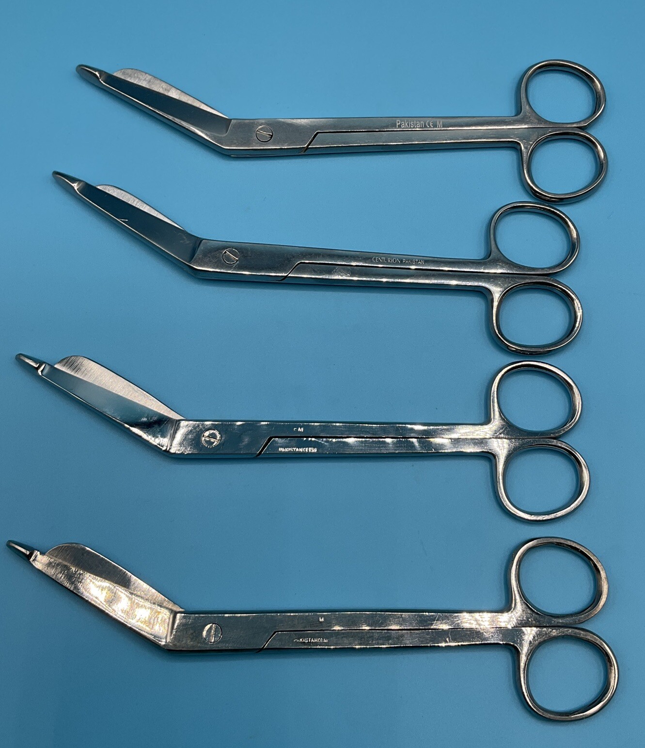 Lot of 4 Pakistan Surgical Plaster and Bandage Shears with Angled Blades