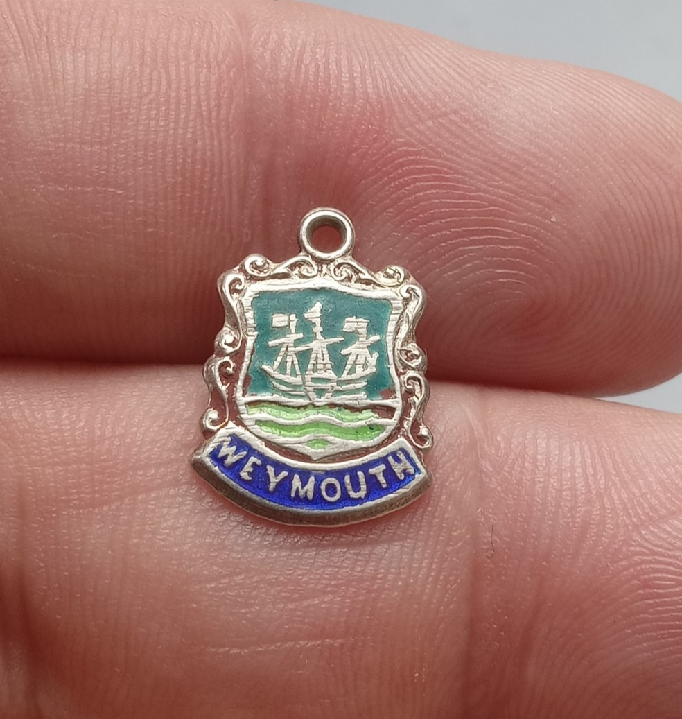VINTAGE SILVER BRACELET CHARM WEYMOUTH TRAVEL SHIELD PLACE NAME CHARM.   CH1-2