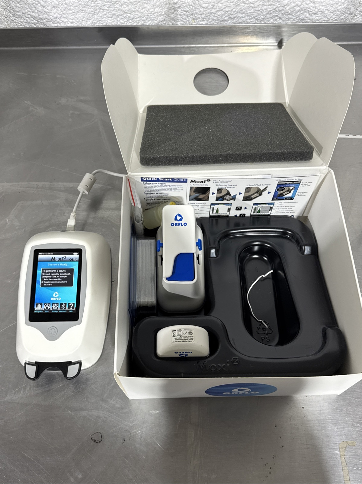 ORFLO Moxi Z Mini automated cassette-based flow cytometer Cell Counter