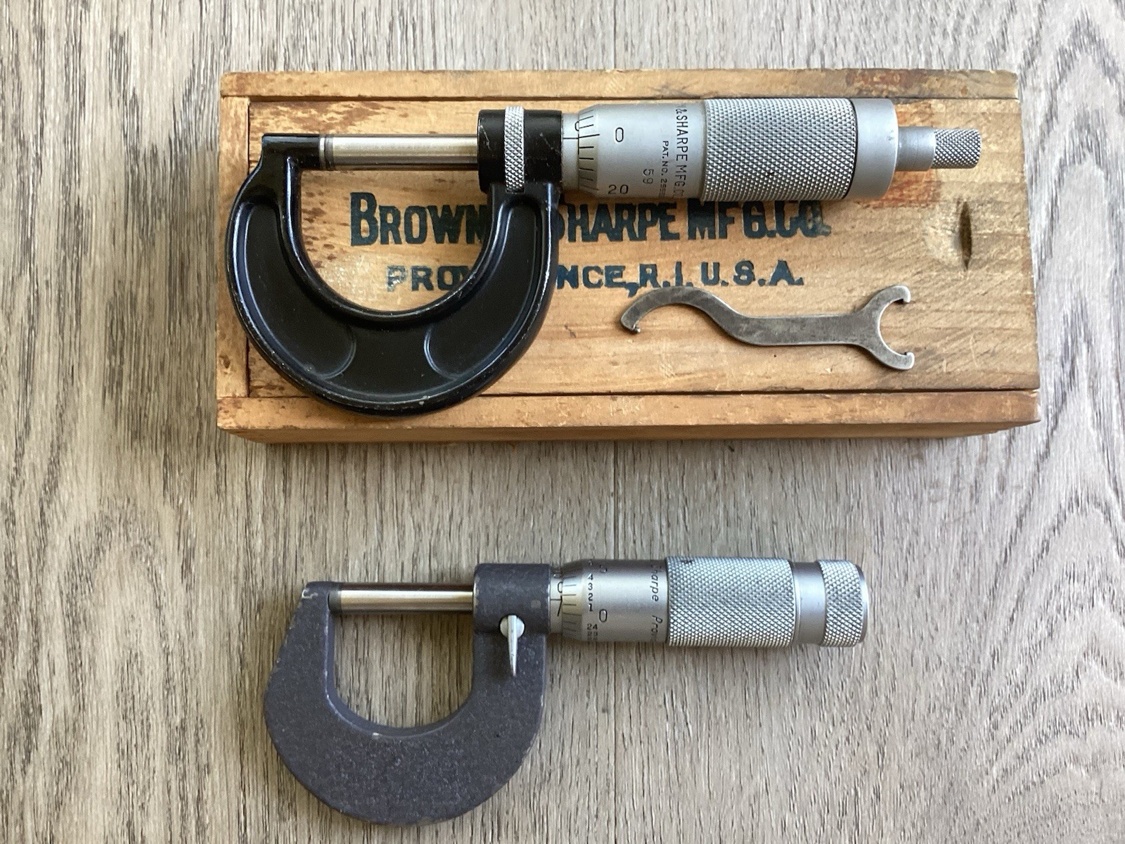 2- Brown and Sharpe 0-1” Micrometers 1 of them has ten thousandth scale.