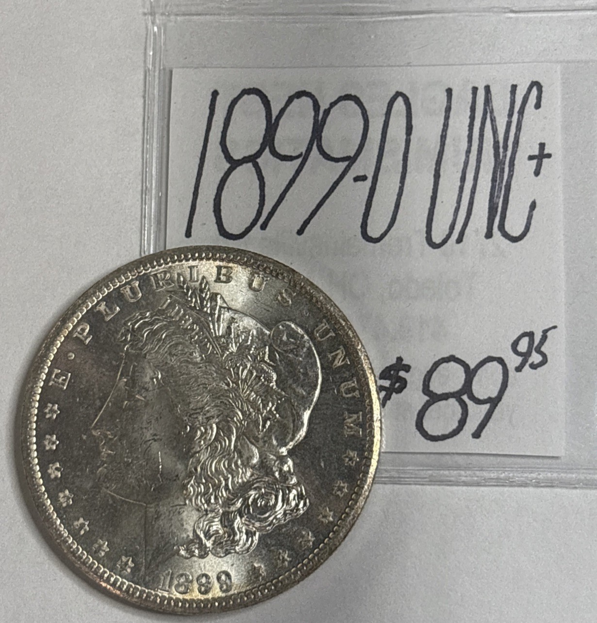 1899-O $1 Morgan Silver Dollar (UNC+) Uncirculated Condition. ENN Coins