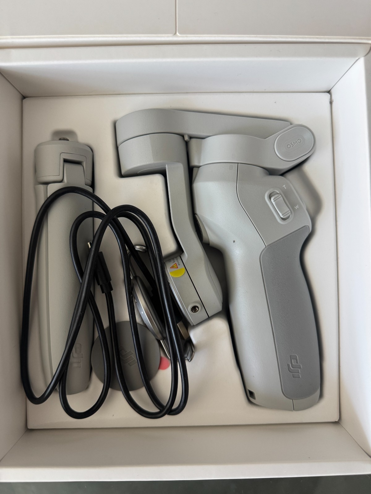 DJI OM 4 smartphone gimbal stabilizer kit.
