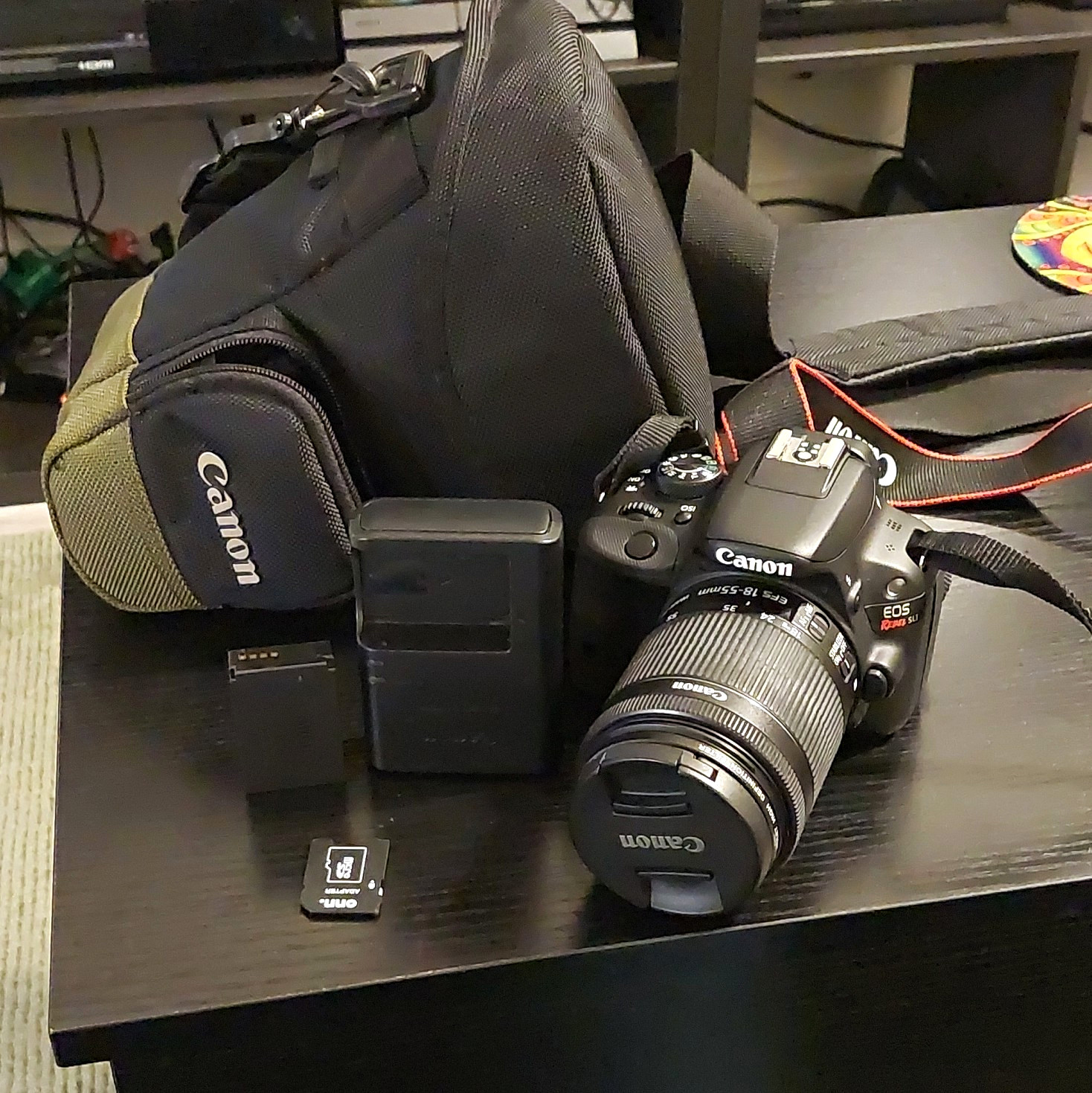 Canon EOS Rebel SL1 DSLR Bundle 18-55mm IS STM Lens Bag Battery Charger SD Adapt