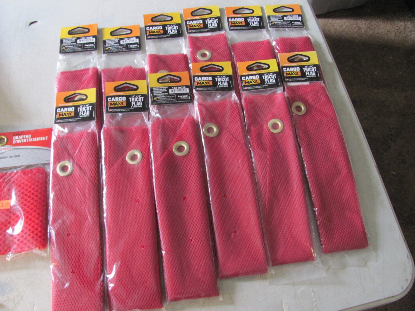 12- Cargo Max 18"x18" Trico Red Mesh flag. 2 grommets. 1-16"x16" no bungee