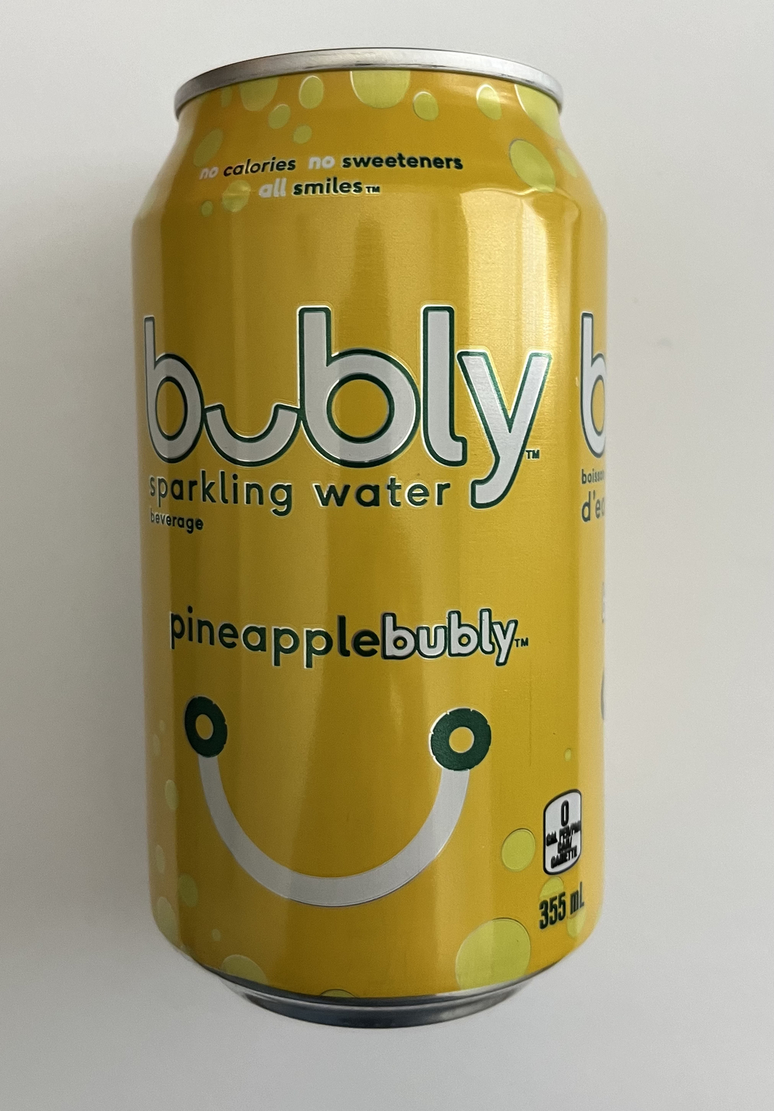 Unopened can of pineapple Bubly (Canada, bilingual, aloha on the tab)