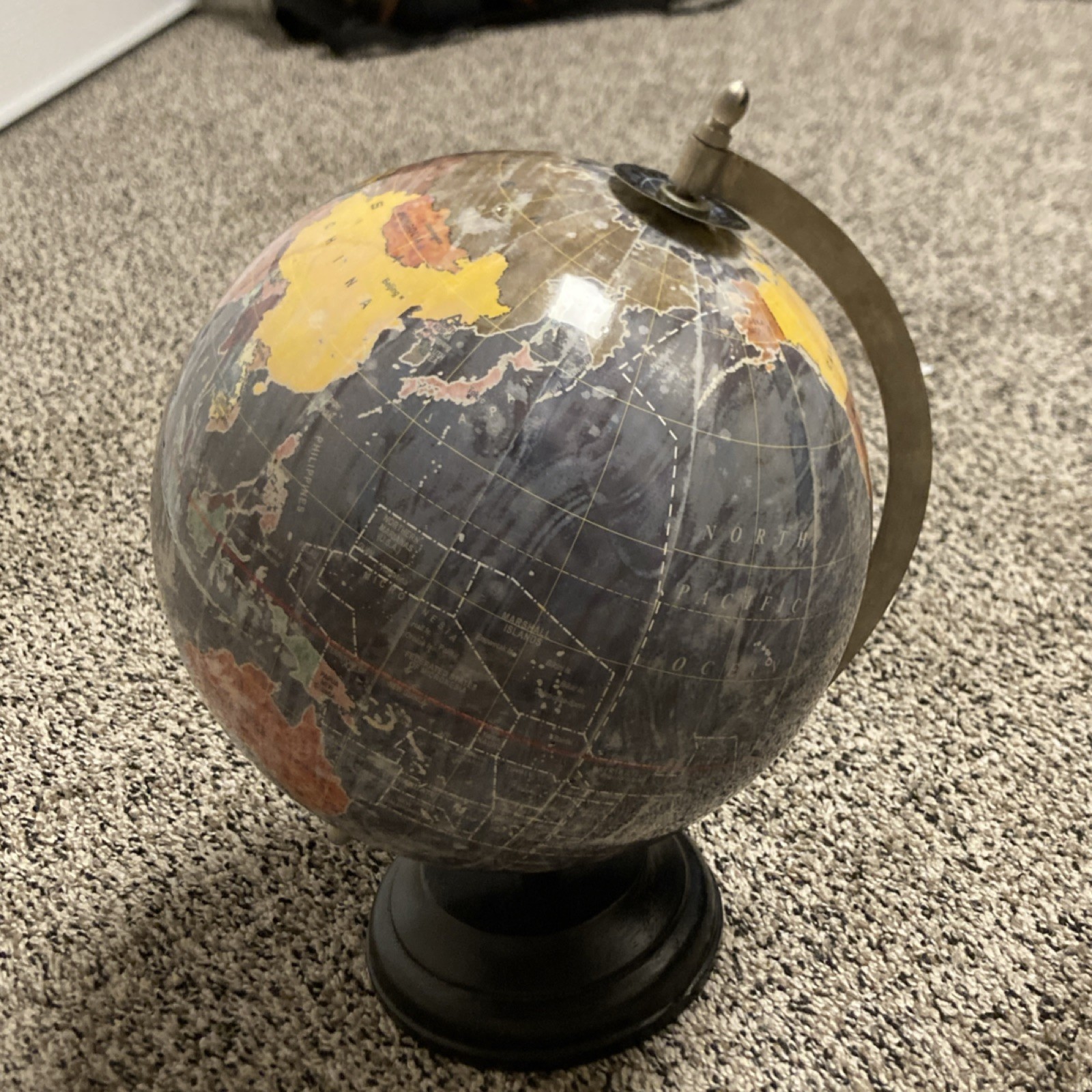 Decorative Multicolor Tabletop Globe, Metal Arm, Black Base, Spinning Feature