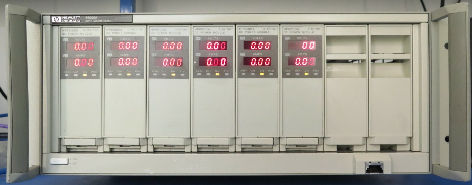 HP 66000A MPS Mainframe /w 2x 66102A, 4x HP66101A DC Power Supply, 2x 5060-3387