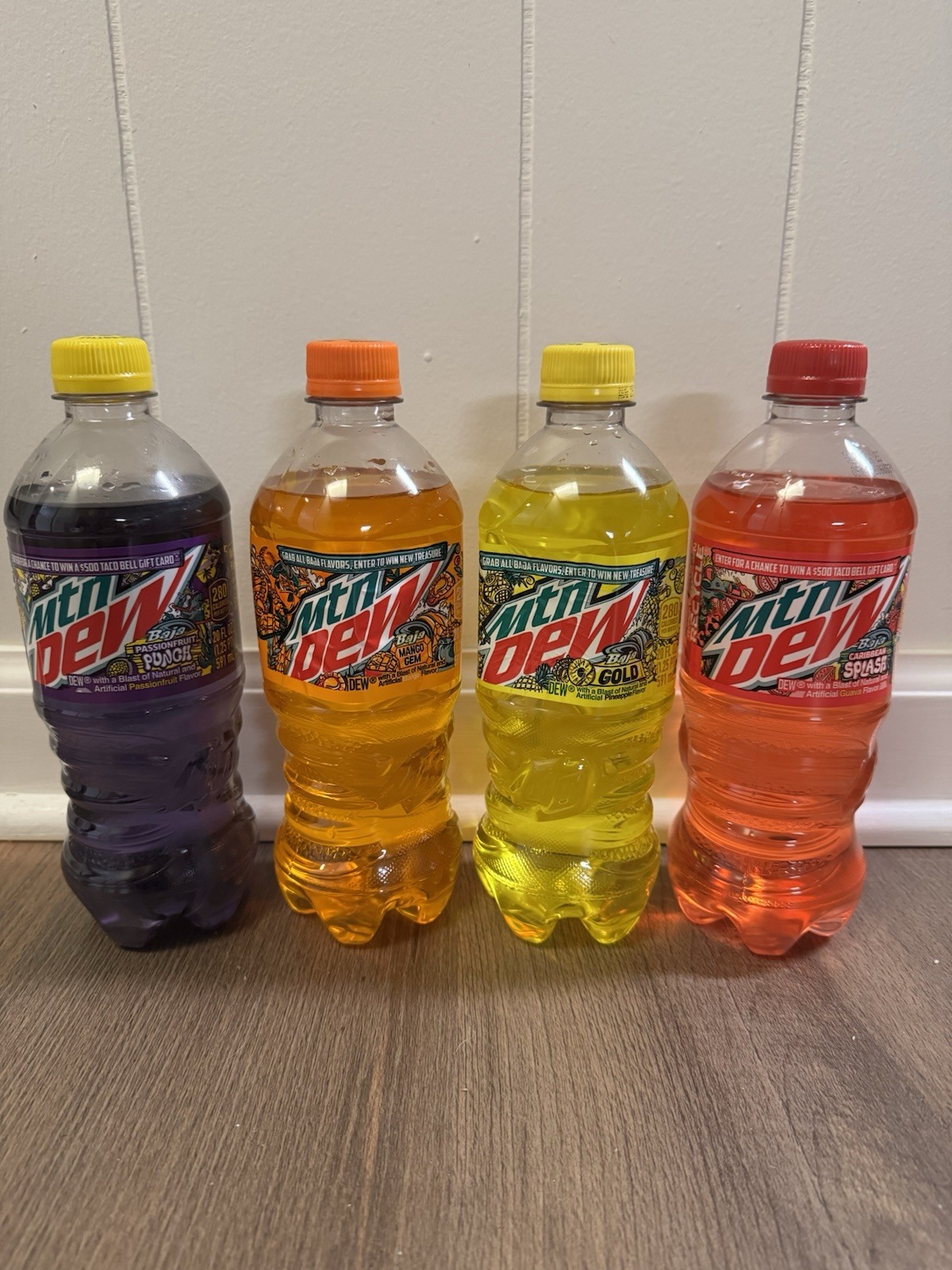 Lot (4) NEW Unopened Mountain Dew Baja 20 oz Bottles Full Punch Splash Gold Gem