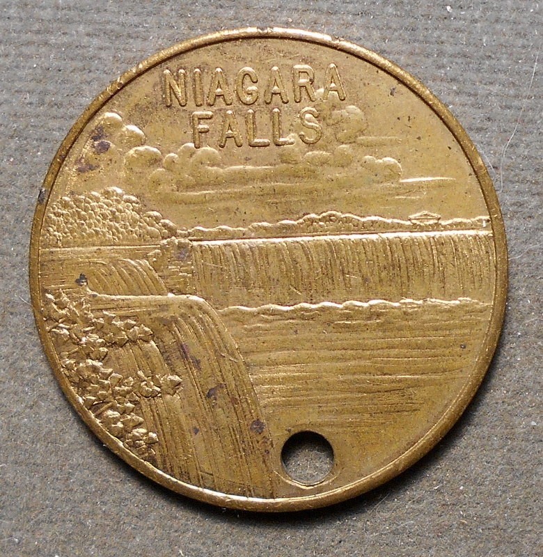 Niagara Falls (Falls)   Good Luck (Luck Symbols). Brass, holed for suspension,