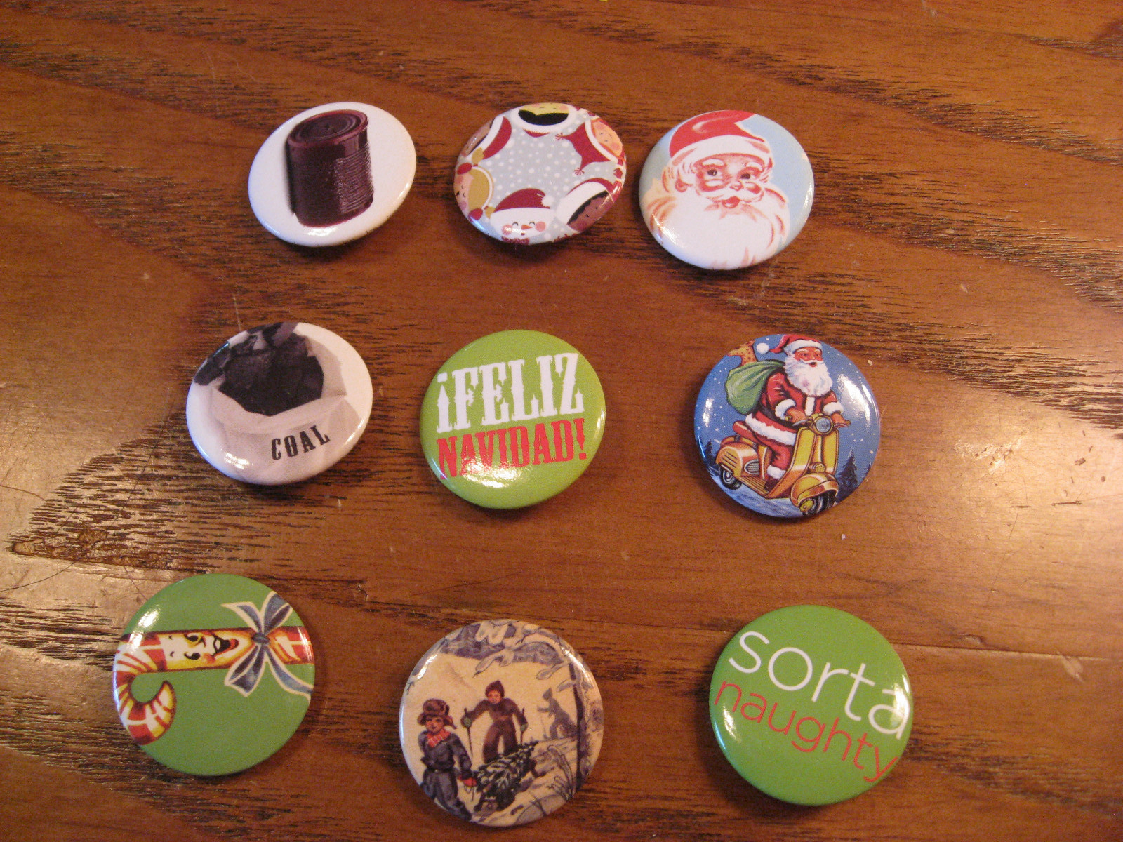 JC Penneys set of 9 Collectible Buttons/ Pins - 2012