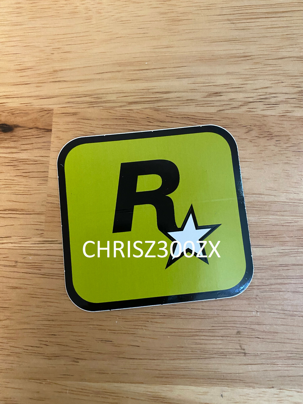 Grand Theft Auto V 5 Rockstar Games LOGO Sticker Decal Olive Green 3" x 3 1/16"