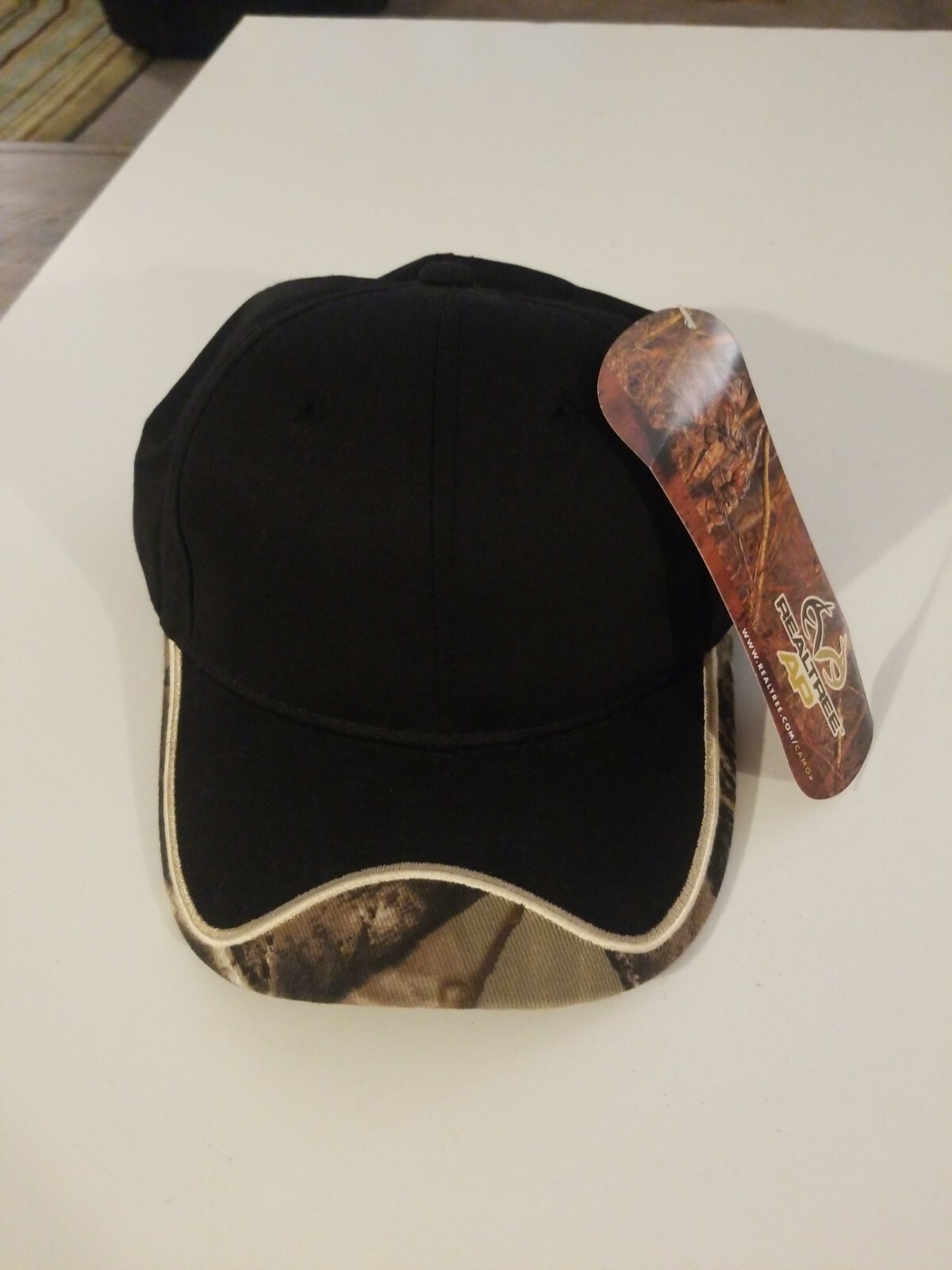 Realtree Camo And Black Sample Hat. New. One Size Fits Most. Cap. Hunting.