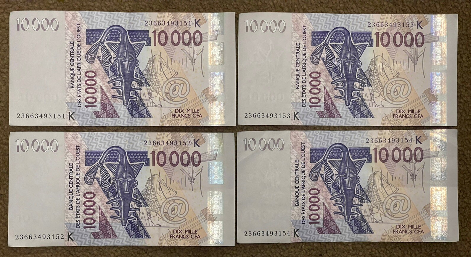 West African States: 4 x 10,000 Francs Banknotes XF condition, consecutive. XOF