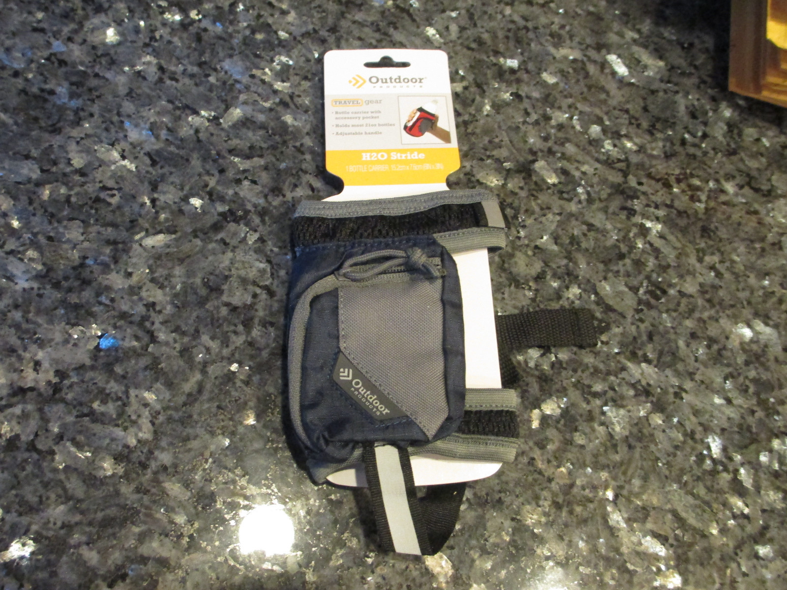 OUTDOOR PRODUCTS H2O STRIDE - 21 OZ BOTTLE CARRIER - BLUE POCKET and HAND STRAP