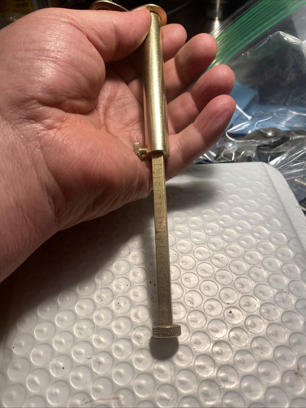 Brass Powder Horn, Measure and Capper.