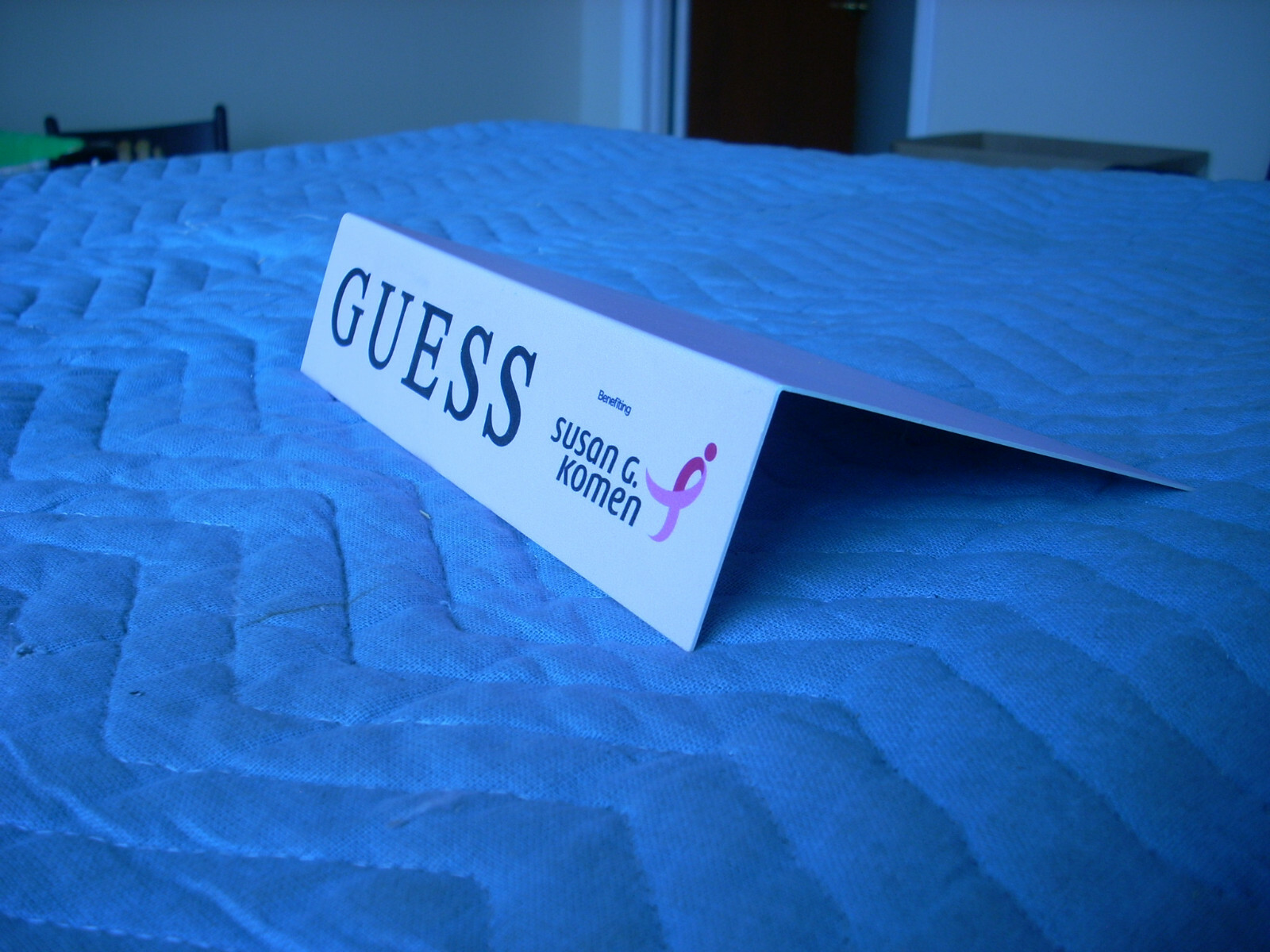 GUESS ADVERTISING SHELF/ TABLE END INSERT PROMOTING SUSAN G. KOMEN FOUNDATION