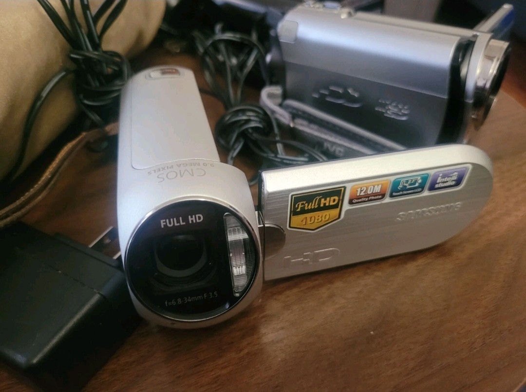 TEN Portable Handheld Camcorders In (Excellent Condition) w/ cords and case