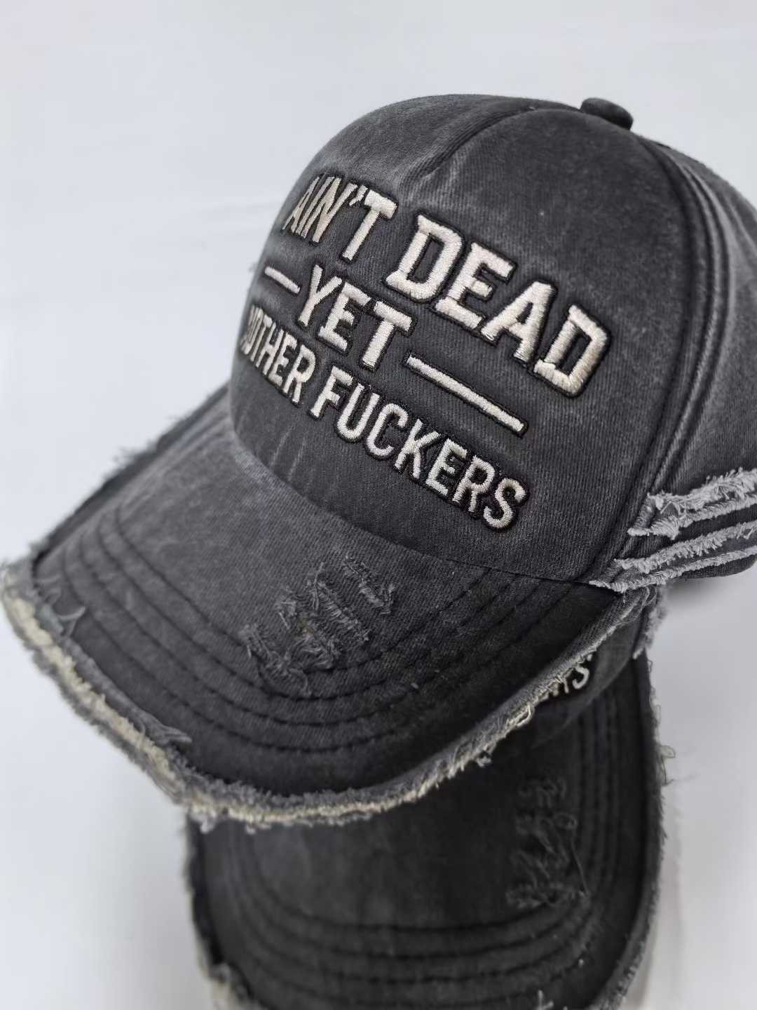 "Ain't Dead Yet Mother *ers" Distressed Black Baseball Cap | Embroidered Dad Hat
