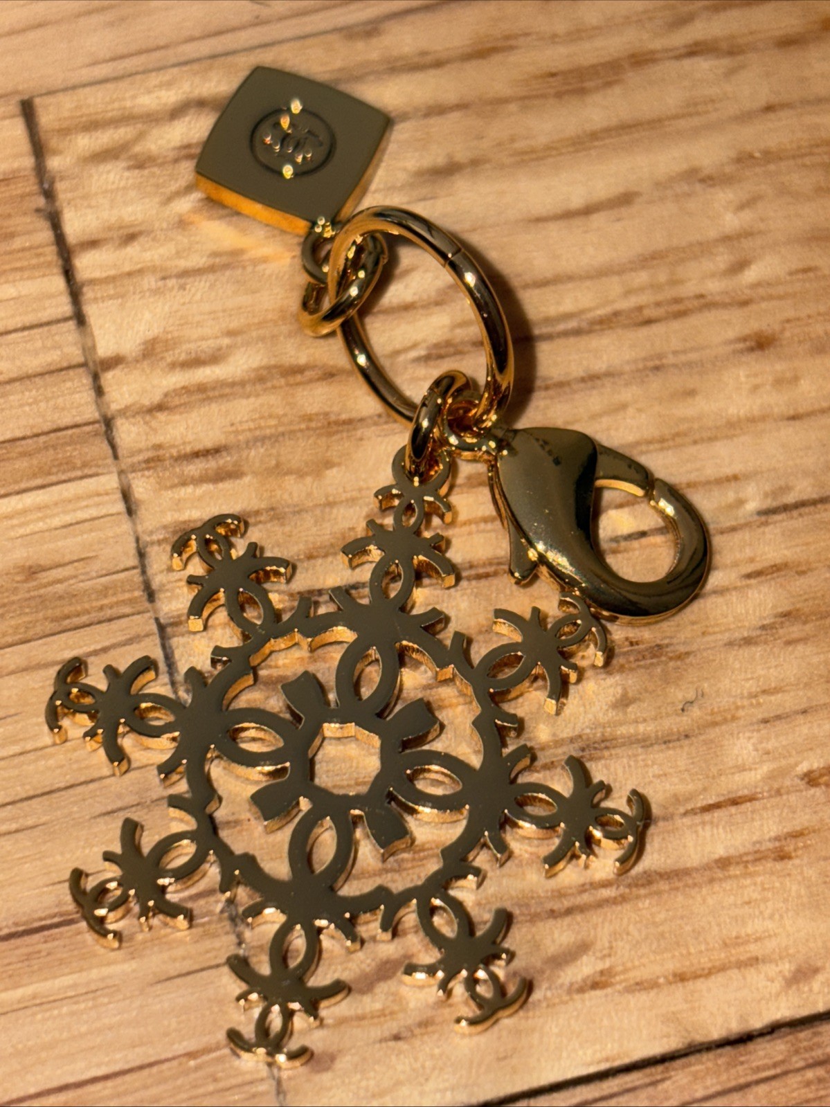 Chanel Charm Christmas VIP Gift  Gold Snowflake Logo Pendant Purse Key Gold New
