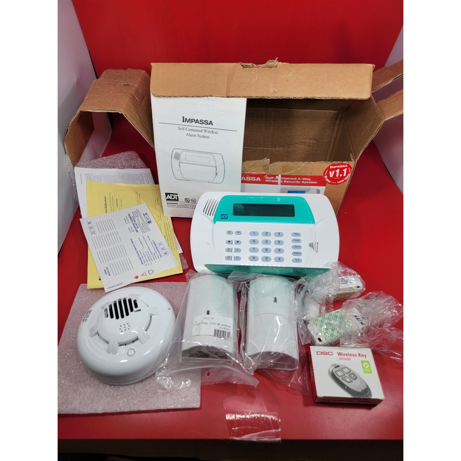 DSC Impassa KIT457-96H Self Contained 2Way Wireless Security System Version 1.1