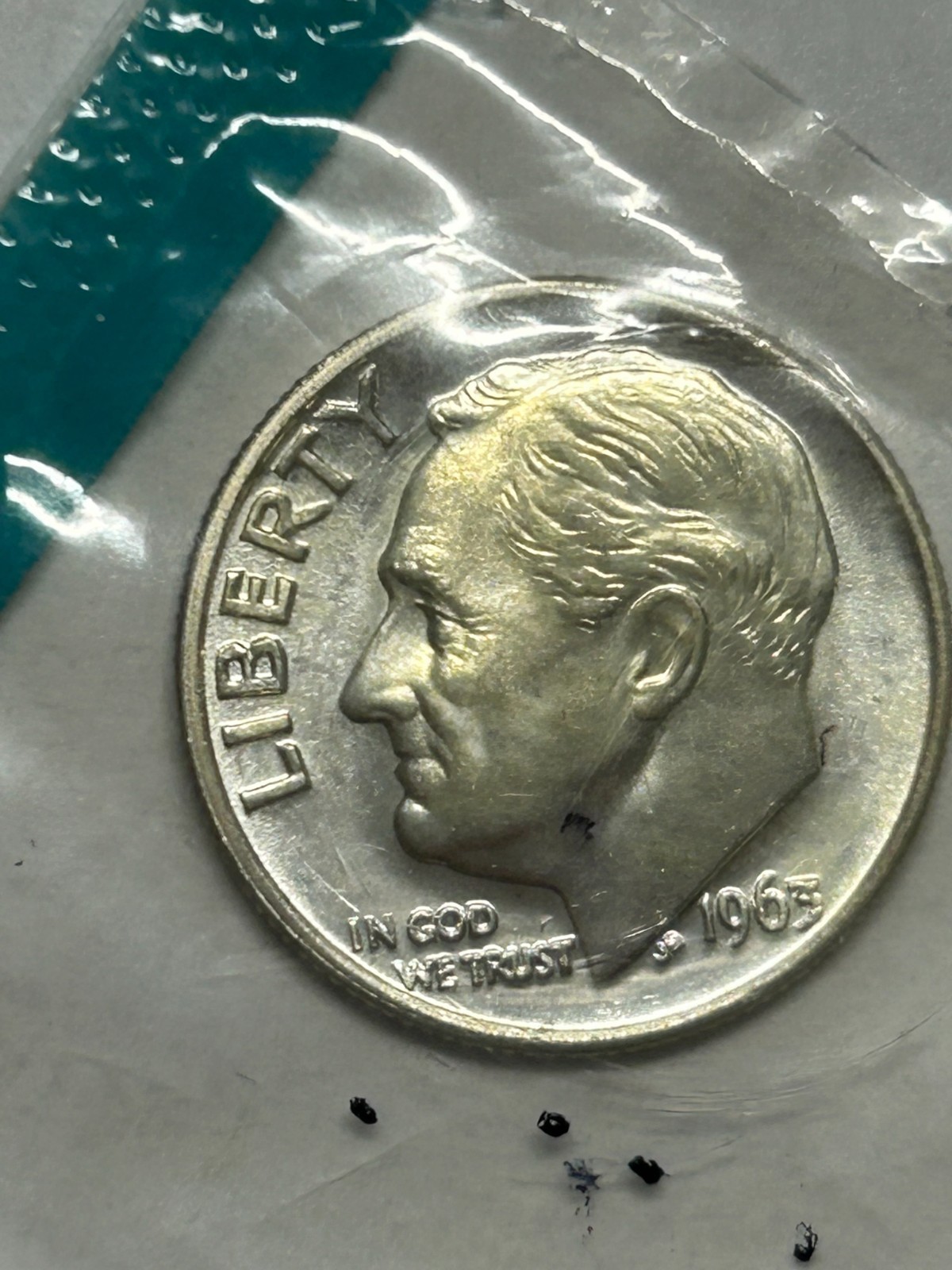 1963 ddo silver Roosevelt Dime.Unc. and still in its original cellophane