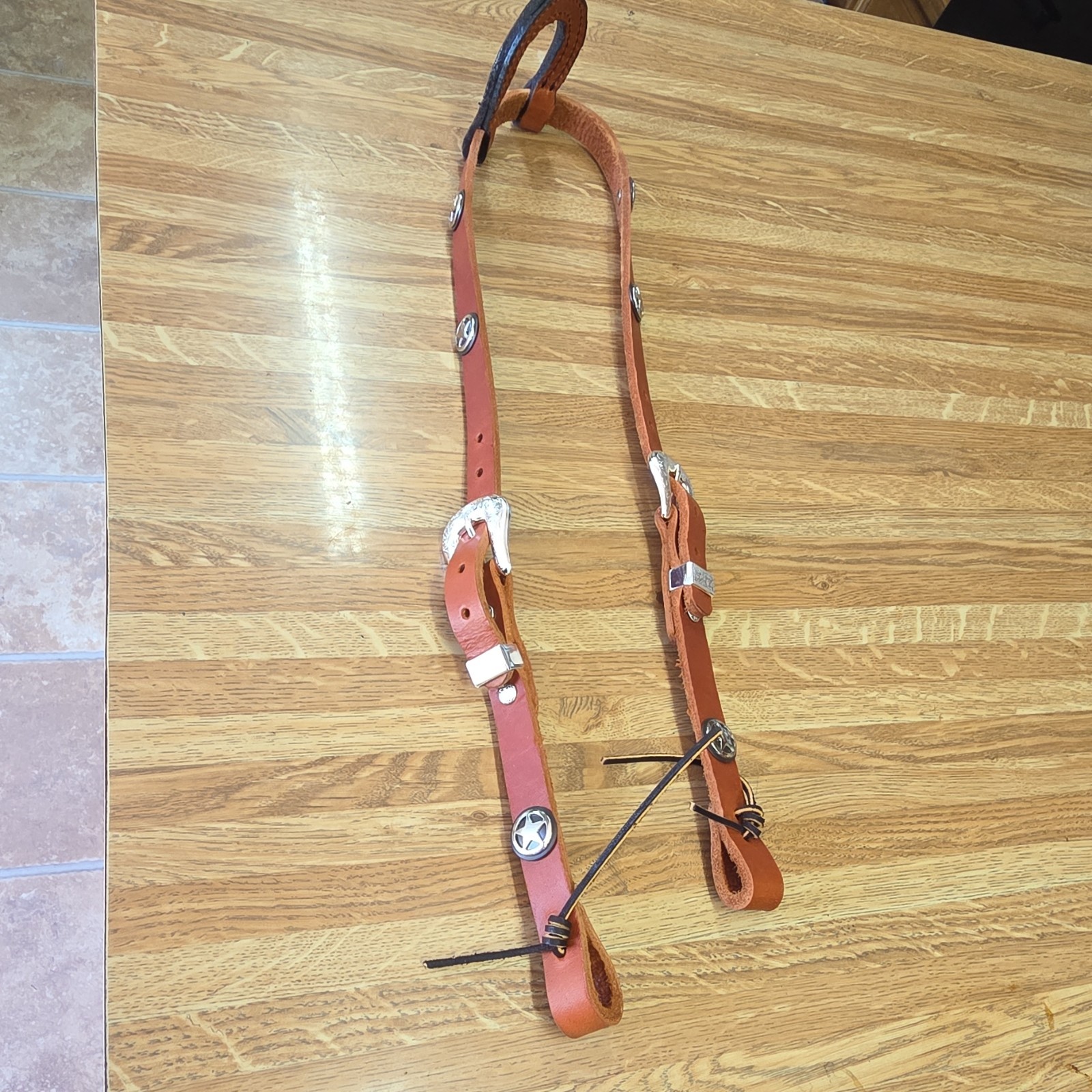 tan one ear headstall w star ponchos. handmade
