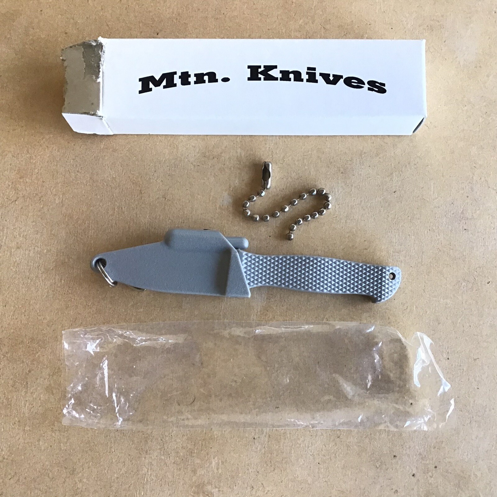 Mountain Knives Hunter’s Scalpel w/ Thumbolt Sheath