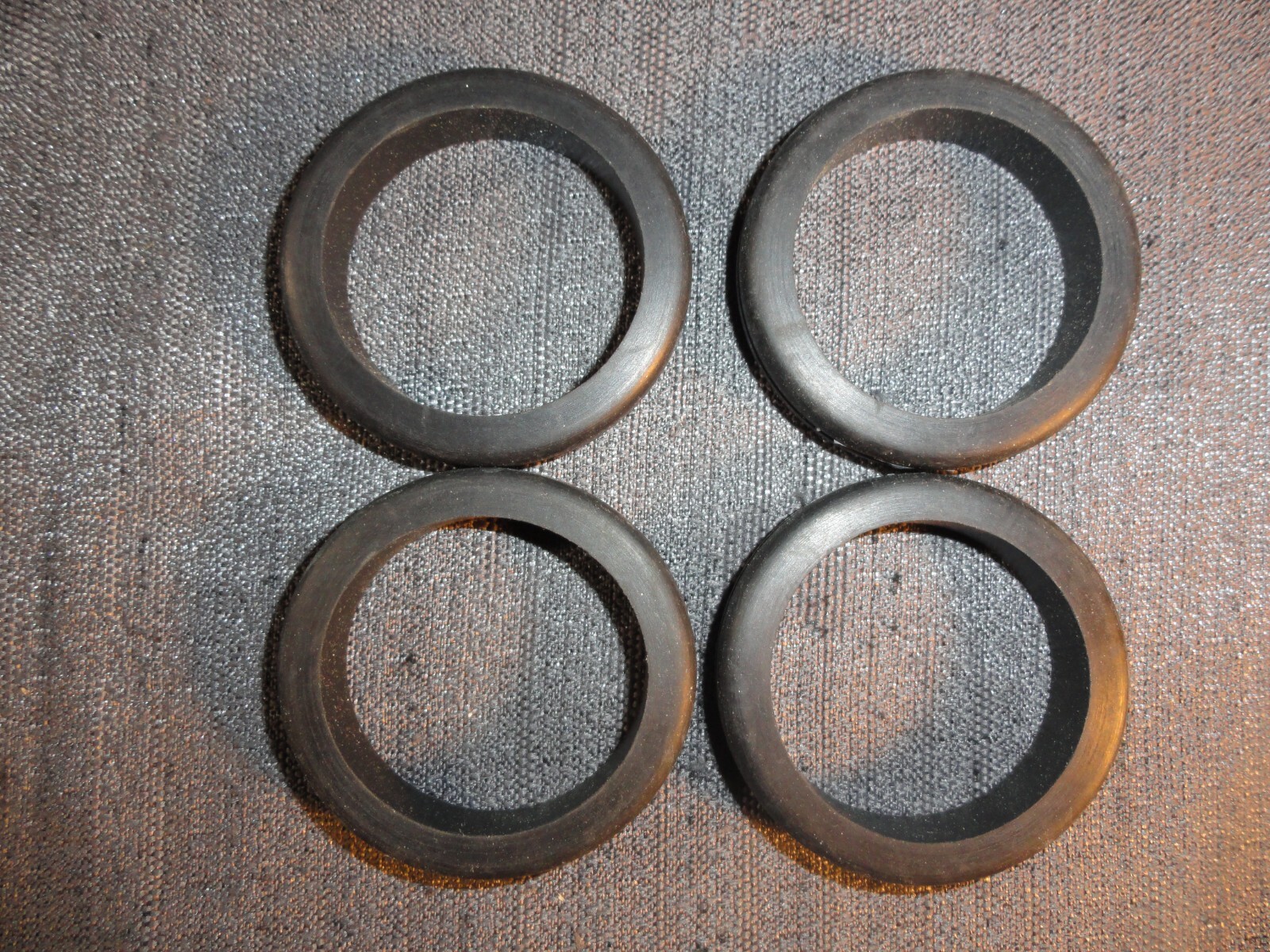 QUANTITY 4 BLACK RUBBER SEALS 2 1/4 INCH DIAMETER