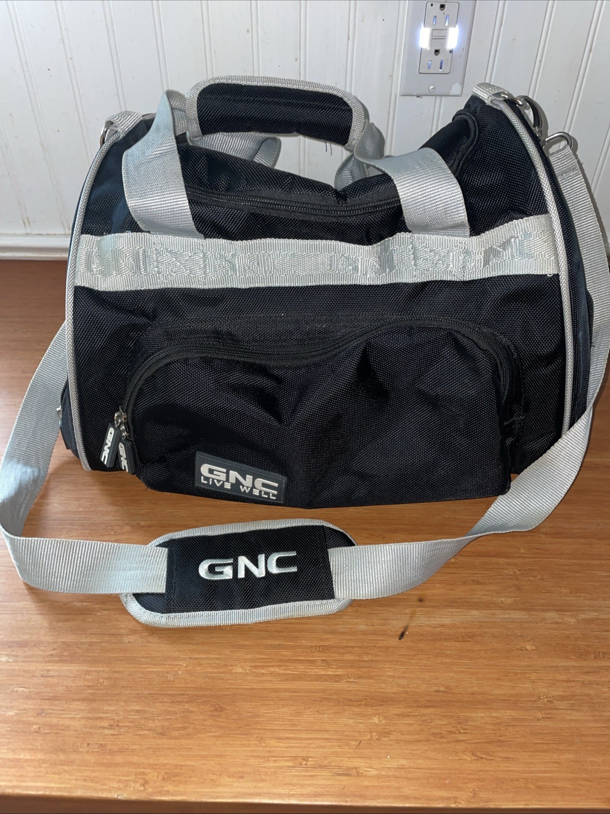 GNC Live Well Duffle Bag Black Gray Handles Adjustable Strap LOGO
