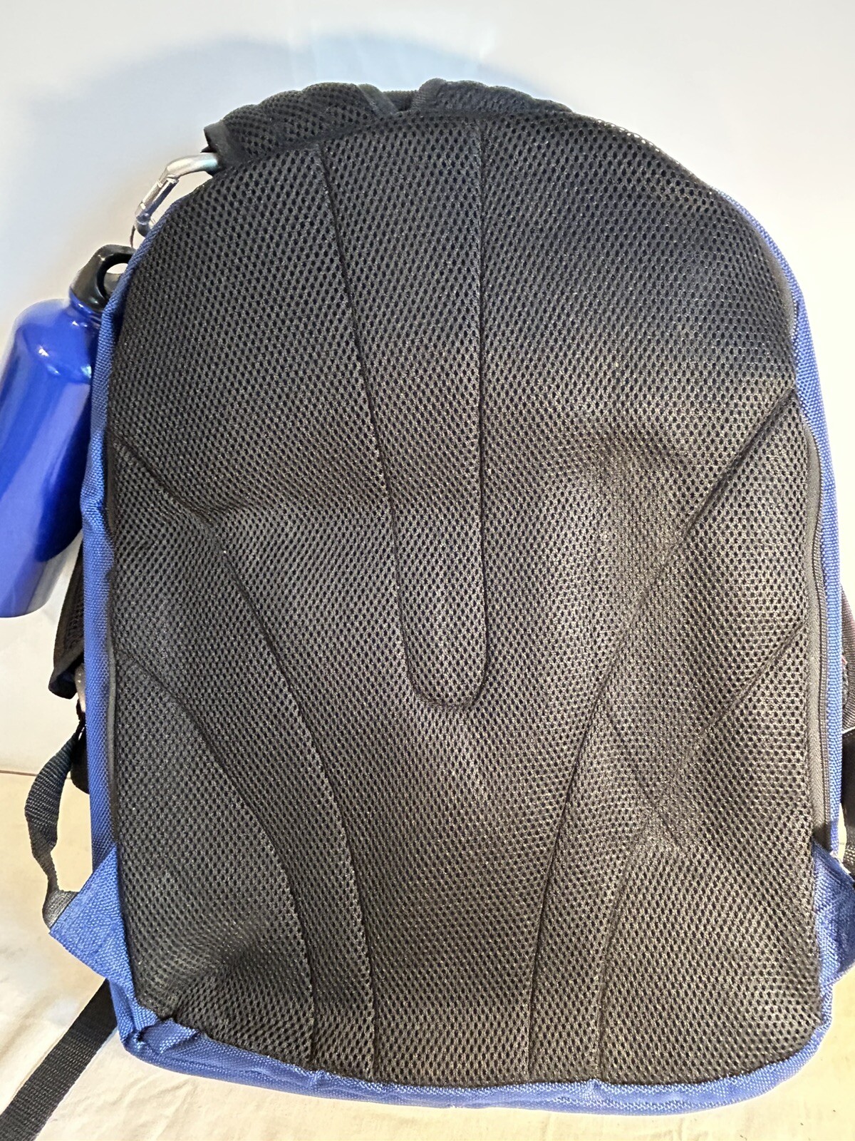 Blue/Grey NGG Swiss Edition Backpack with blue water bottle computer school