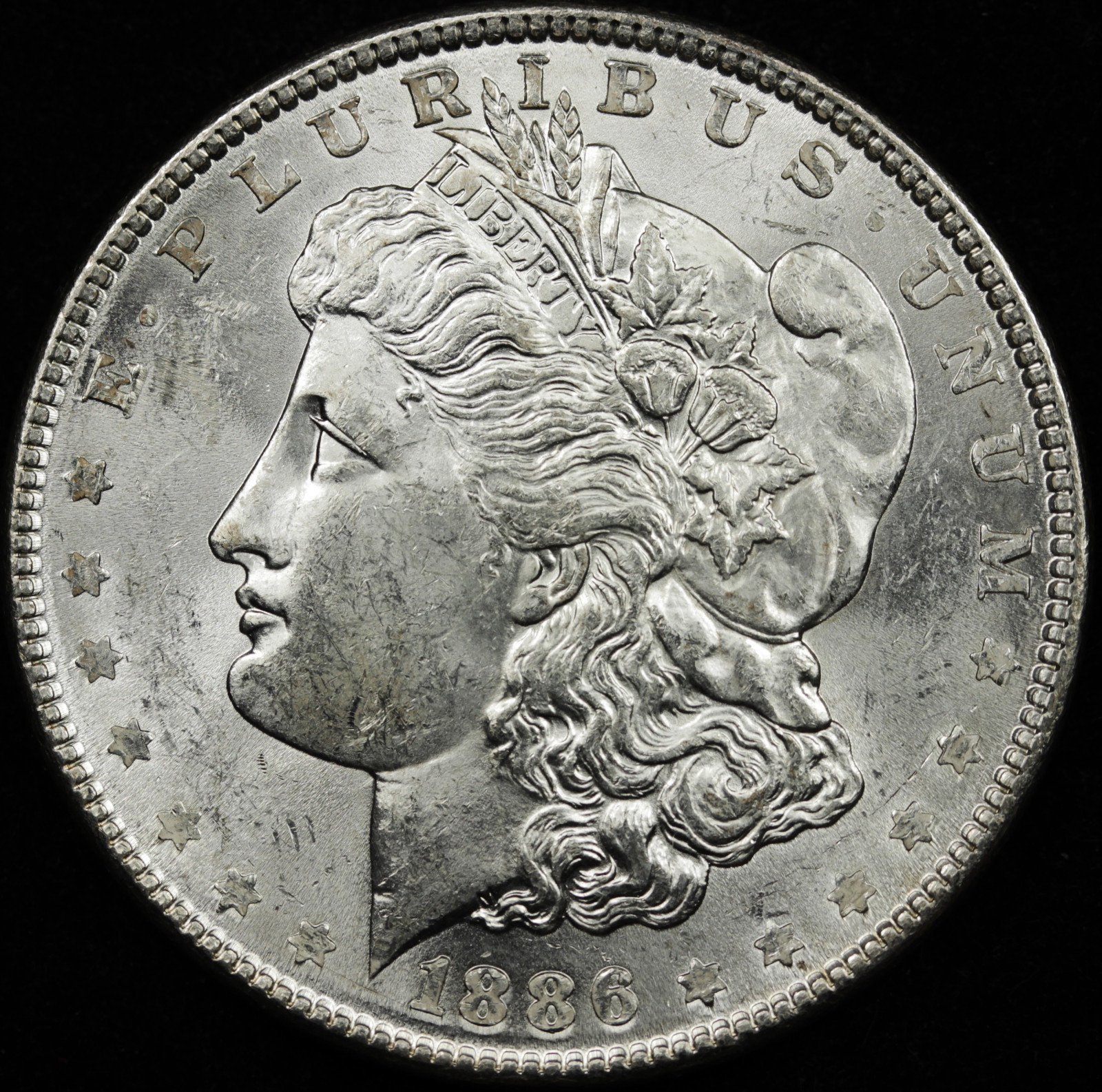 1886 Morgan Silver Dollar.  B.U.*   (Inventory A)