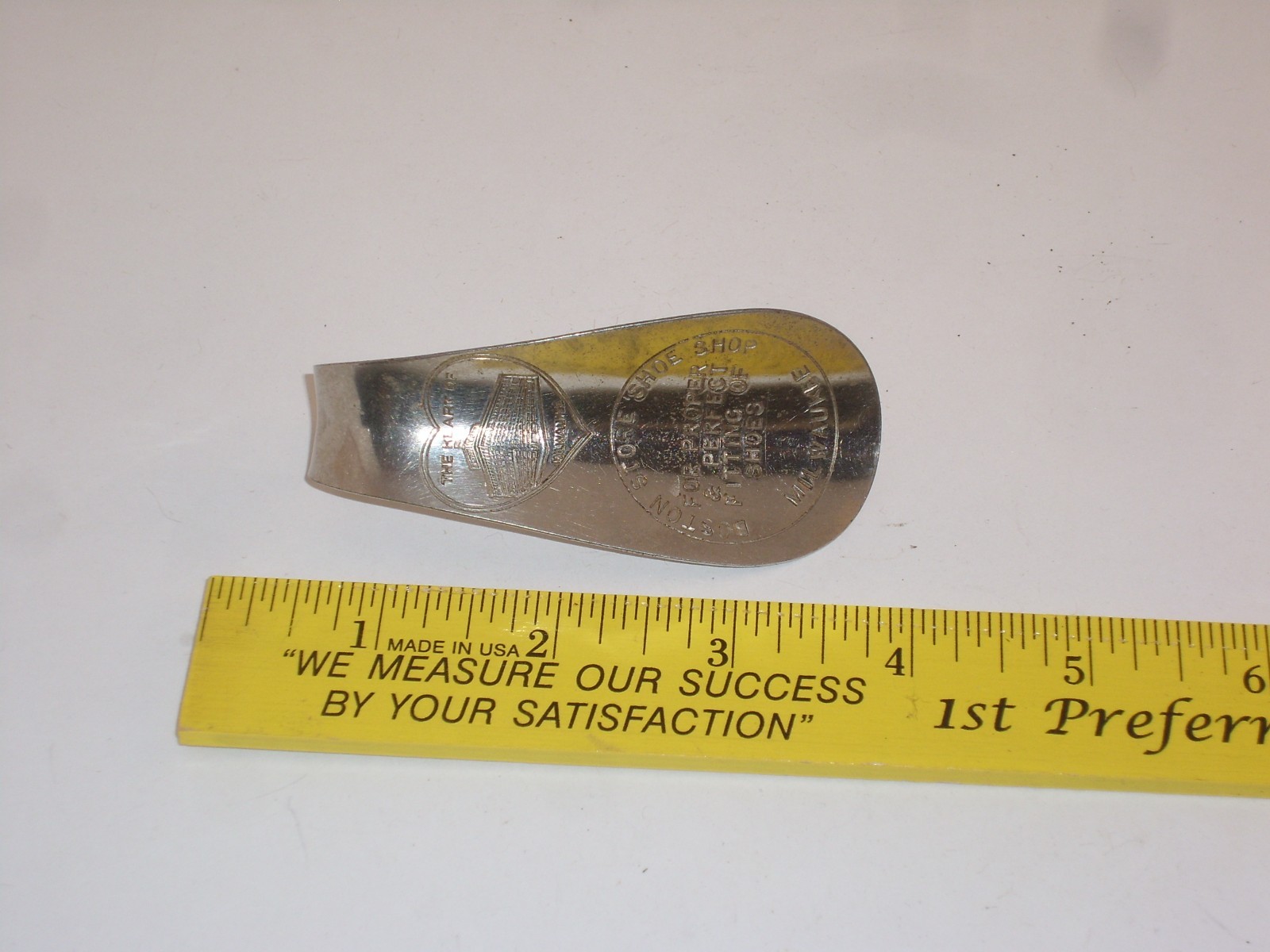 Antique Boston Store Milwaukee steel advertising shoe horn "The heart of Milw."