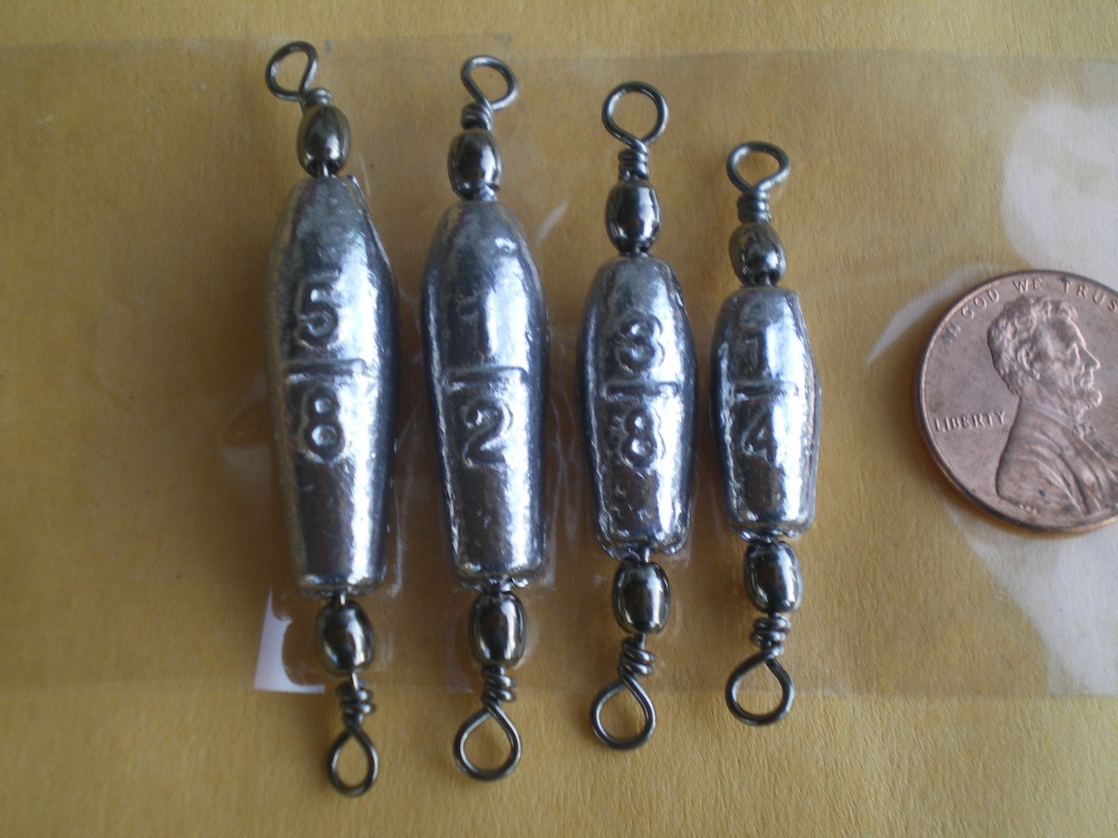 24 PCS. TROLLING SINKER W/#7 BLACK BARREL SWIVEL 5/8, 1/2, 3/8 OZ. 8 EACH SIZE