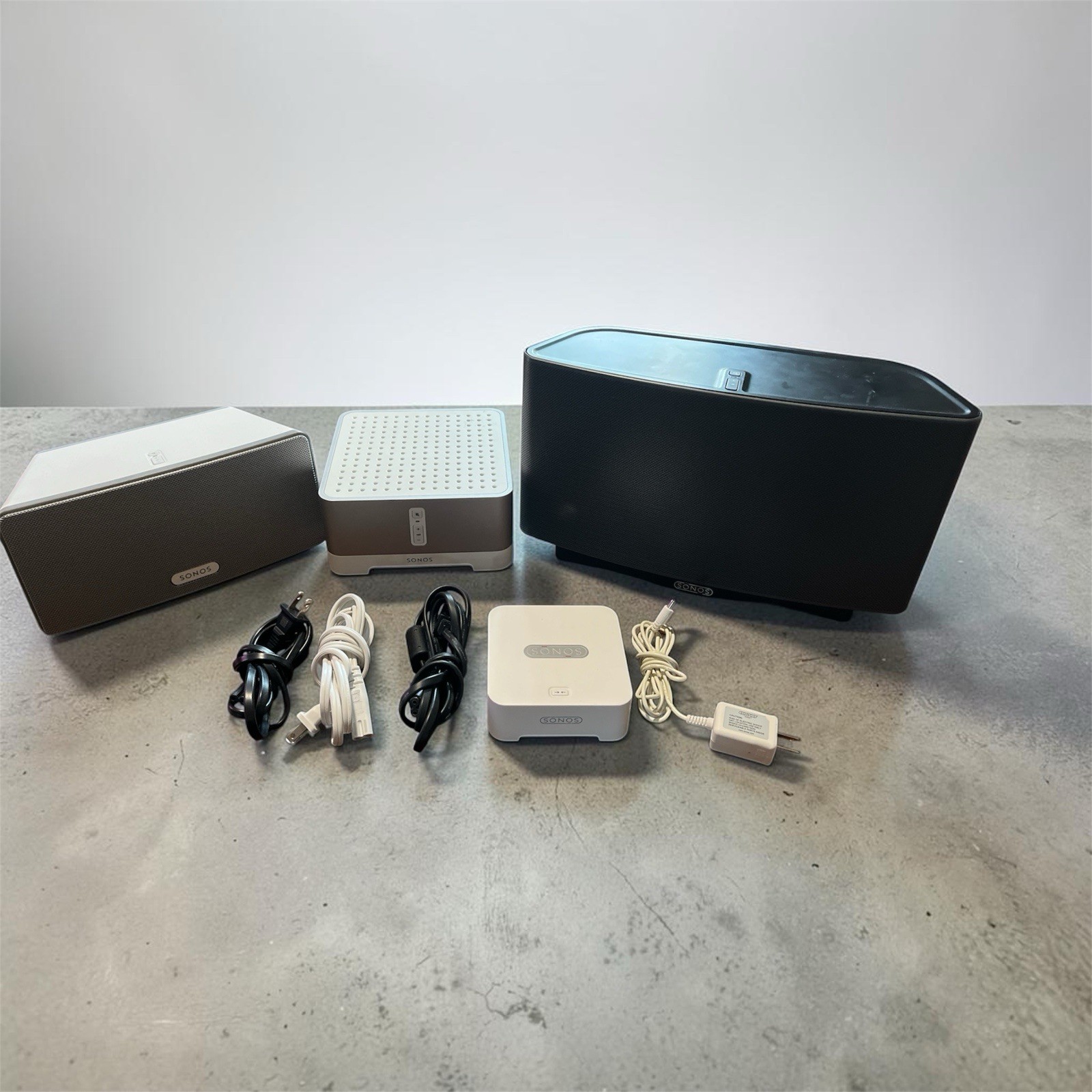 Lot of Sonos Speakers: Play 3, S5, Connect Amp, & Zonebridge BR100 With Cords.
