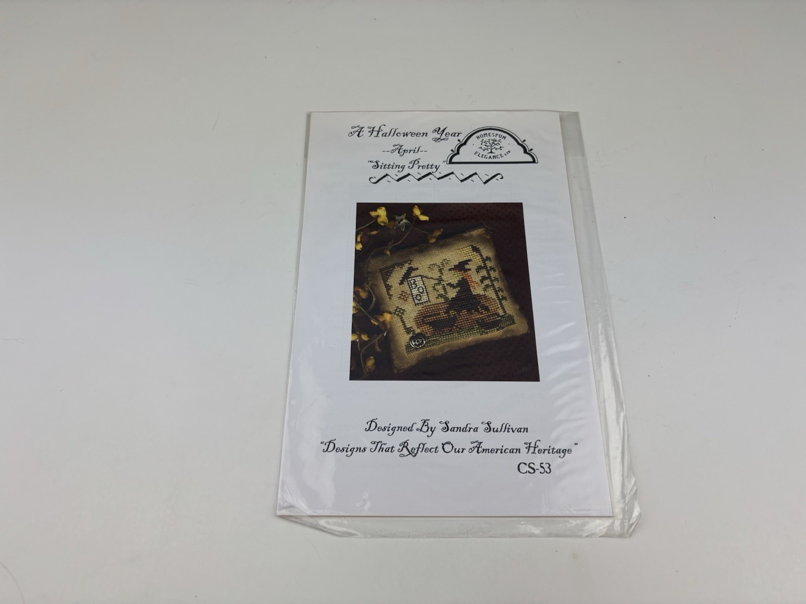 Homespun Elegance April Sitting Pretty Counted Cross Stitch Pattern 6S