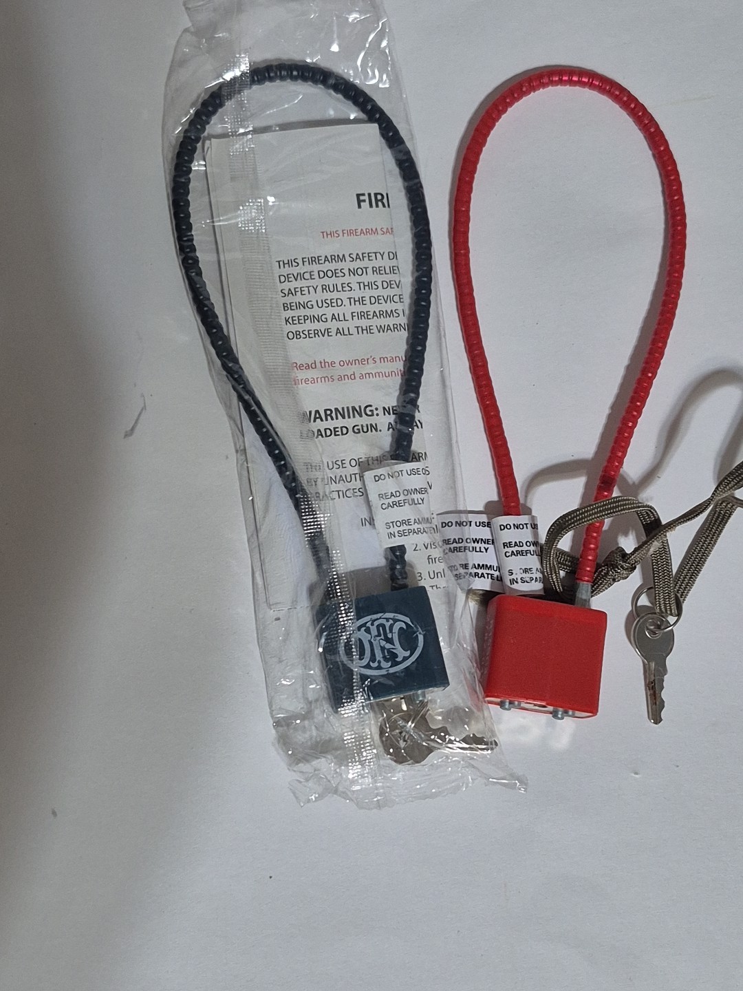 NEW FN Small Pistol Firearm Cable Lock Black 30mm/15inches And 1 Used Cable LOCK