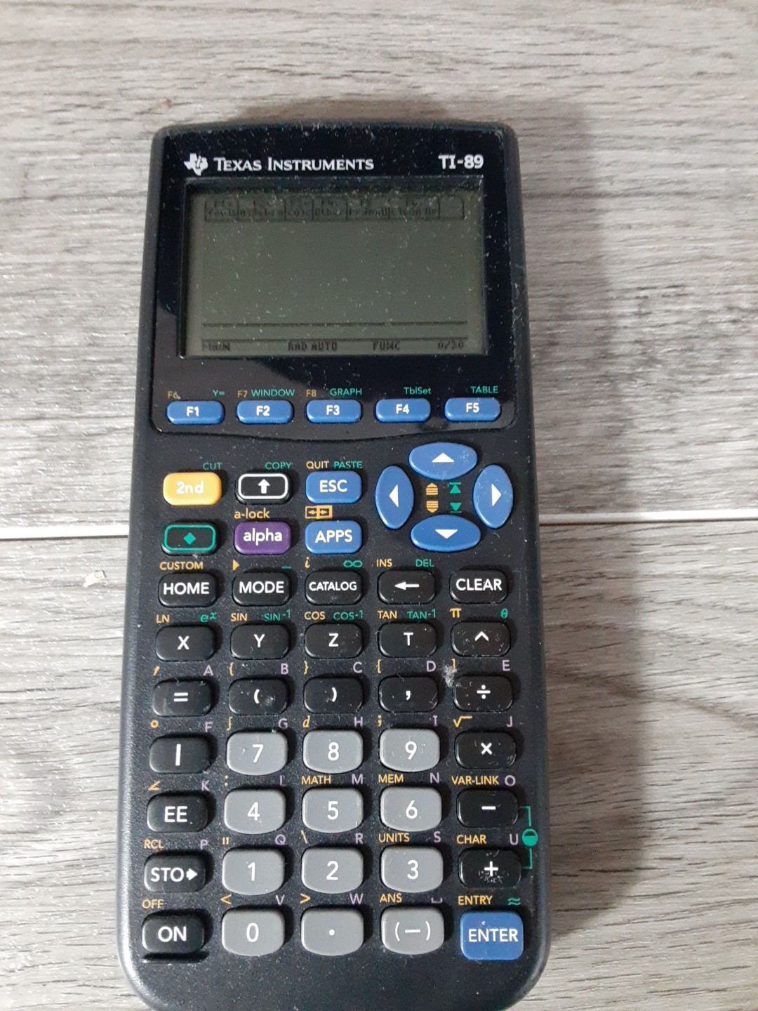 Texas Instruments TI-89 Graphing Calculator (1999) *TESTED WORKS*